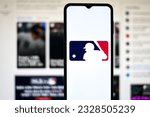 Small photo of Selective focus of the MLB (Major League Baseball) logo. It is the premier professional baseball league in North America, featuring top players and teams: Dhaka, Bangladesh- July 2, 2023