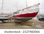 Small photo of Storm Eunice caused damage in the Netherlands in February 2022. The tarpaulin of this sailing yacht has been torn to pieces by the wind