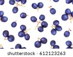 Blue ripe grape berries, seamless photographic pattern, top view, isolated on white background. Overhead shot. Structure of blue heap of ripe berries. Layout of grape pieces. Wine berries texture.