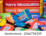Small photo of Amsterdam, Netherlands - February 25, 2023: Tony's Chocolonely Tiny Tony's Package with Dark