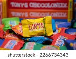 Small photo of Amsterdam, Netherlands - February 25, 2023: Tony's Chocolonely Tiny Tony's Package with Milk Nougat
