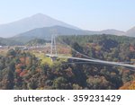 Kokonoe, Kusu District, Oita Prefecture , Japan: Kokonoe Grand Suspension Bridge Scenic Autumn Landscape, It is 173M tall and 390M long. It is the highest bridges for pedestrians in Japan.