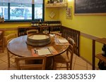 Small photo of Albaretto della Torre; Italy - Sept 7, 2022: The interior of the family restaurant Ristoro La Torre in Albaretto della Torre with great Piedmont cuisine