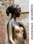 Small photo of Statue of Juliet Capulet in Her House Backyard in Verona, Veneto, italy