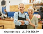 Small photo of Proud to say were open for business. Shot of a senior couple running a small business together.