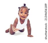 Small photo of So much to see.... Studio shot of a baby girl crawling against a white background.
