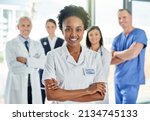 Small photo of Your health is of the utmost importance. Shot of doctors in a hospital.