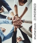 Small photo of Teamwork, collaboration and unity between business people with their hands stacked for project development and innovation. Group of corporate colleagues united, joining or working together from