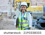 Small photo of Happy engineer, construction worker or architect woman feeling proud and satisfied with career opportunity. Portrait of black building management employee or manager working on a project site