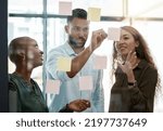 Small photo of Team strategy meeting on research, post it on glass wall and group work planning together. Business people brainstorming analytics vision think tank ideas, collaboration thinking and sticky notes