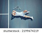 Small photo of Tired tennis sports loser man on floor with racket, ball and court in summer sun from above. Relax and fitness player lying on ground, resting or taking break after match, game or outdoor practice