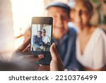Pov, phone and woman taking picture of old couple at restaurant. Love, smile and elderly, romantic and retired couple hug with person taking photo for happy memories, 5g mobile or social media post.