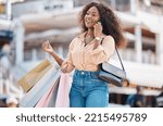 Shopping, fashion bag and phone call for black woman on 5g communication about retail spree or sales discount. Shopping mall product, boutique fabric clothes and happy customer with designer gift