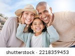 Small photo of Family, smile and face portrait in nature on holiday, vacation or summer trip. Diversity, travel and parents, father and mother with girl, love and care, spending quality time together and bonding.