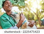 Small photo of Vet, happy and nurse with a dog in nature doing medical healthcare checkup and charity work for homeless animals. Smile, doctor or veterinarian loves nursing, working or helping dogs, puppy and pets