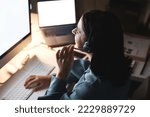 Call center, computer screen and woman with business communication, multimedia IT support and virtual advice in e commerce. Happy telemarketing, insurance advisor or digital crm agent in night office