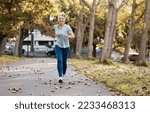 Small photo of Fitness, running and health with old woman in park for peace, workout and morning jog. Retirement, relax and jogging with senior runner training in nature for endurance, stamina and sports