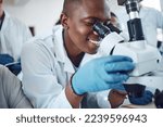 Small photo of Science, microscope and students learning in class, classroom physics and happy with research in a lab. Innovation, scientist and African teenager in high school studying microbiology for education