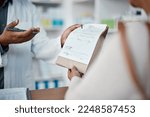 Healthcare, pharmacist hands with medicine for woman at counter buying prescription drugs at drug store. Health, wellness and medical insurance, man and customer at pharmacy for advice and pills.