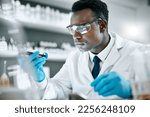 Small photo of Black man, research and tube for test sample, focus and thinking for cure, innovation and diagnosis. African American male, researcher or scientist with vial, data analysis or decision for experiment