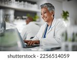 Small photo of Scientist, senior woman and lab with laptop, research and plants with analytics, pharmaceutical study and focus. Elderly science expert, computer and typing for data analysis for goal in laboratory