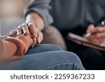 Small photo of Closeup, hands and support in therapy, conversation and grief with compassion, empathy or support. Zoom, hand or female with sadness, therapist or communication for solutions, mental health or stress