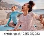 Small photo of Yoga, laugh and woman friends on the beach together for mental health, wellness or fun in summer. Exercise, diversity or nature with a female yogi and friend laughing or joking outside for humor