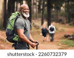 Portrait, black man and hiking in forest, exercise and fitness for wellness, healthy lifestyle and smile. Face, senior male and mature gentleman with backpack, smile and hiker in woods and fresh air