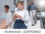 Small photo of Business woman, smartphone at office with motion blur and communication, fast pace and busy with technology and wifi. Chat, email and social media, female and speed with movement and mobile app