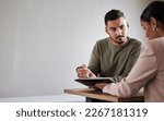 Small photo of Legal contract, injury or man with lawyer woman planning labor law for insurance, compliance and HR agreement. Mockup, advisor and consulting client for security claim or disability compensation