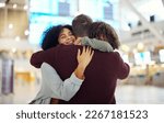 Small photo of Travel, family and hug in airport, reunion and happiness for international trip, getaway and cheerful. Love, man and woman with child, kid or goodbye for traveling, embrace or departure with greeting