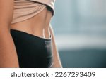 Small photo of Fitness, exercise and woman with flat stomach at gym for training workout for healthy weight management. Sports, abs and tummy tuck, sporty girl with slim waist and fit belly on diet for body care.