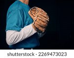 Baseball pitcher, hand and glove in studio for sport, training and throwing by black background. Man, cropped and hands for exercise, strikeout or athlete with sports, game or competition for workout