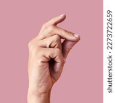 Small photo of Click, finger snap and hand of man in studio for attention, ok and idea expression isolated on pink background. Sound, natural and yes with person and flick gesture for action, success and easy