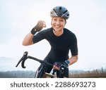 Fitness, celebration and portrait of woman cycling with power fist, success or victory in the countryside. Happy, sports and face of lady cyclist celebrating workout achievement, milestone or winning