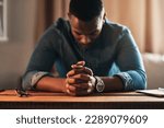Small photo of Quiet, calm and spiritual man praying while kneeling with his hands clasped alone at home. Prayerful, spiritual and religious, Christian male saying a daily prayer in the morning in a bedroom