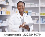 Small photo of Portrait of black woman in pharmacy with tablet, smile and online inventory list for medicine on shelf. Happy female pharmacist, digital checklist and medical professional checking stock in store.