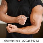 Small photo of Arm, steroids and syringe with a bodybuilder man using a needle for a bicep muscle injection closeup. Fitness, health and testosterone with a male athlete or sports person injecting illegal substance