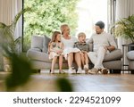 Small photo of Full body young smiling caucasian family embracing each other and bonding in a home living room on a weekend. Mother and father sitting with children on a sofa. Loving parents and siblings talking