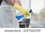 Small photo of The toughest disinfectant this side of the west. an unrecognisable man using rubber gloves and disinfectant to clean his home.