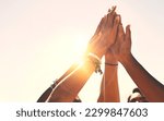 Small photo of Hands, high five and and group of people outdoors for solidarity, trust and goal collaboration. People, commitment and friends with hand in support of success, celebration and partnership or unity