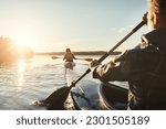 Kayak  lake and people rowing a ...