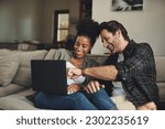 Small photo of Laptop, interracial and entertainment with a couple watching a video using an online subscription service to relax. Computer, streaming or internet with a man and woman bonding together over a movie