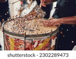 Small photo of Music, drums and carnival with a person playing an instrument during a festival in rio de janeiro. Hands, party and brazil with a musician, performer or artist banging on a drum to create a beat