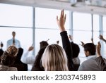 Small photo of Conference, crowd and business people with hands for a question, vote or volunteering. Corporate event, meeting and hand raised in a training seminar for questions, voting or audience opinion