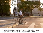 Crosswalk, bike and business man in city for morning, sustainable travel and carbon footprint. Cycling, transportation and urban with employee walking on commute for journey, transit and professional