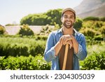 Small photo of Farming, spade and portrait of man or farmer in agriculture, sustainable garden or small business owner in field. Farm, land and face of happy person with plants, eco friendly and agro sustainability
