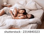 Small photo of Morning, home bedroom and happy couple wake up with smile, love and relax on bed for wellness, rest and care. Happiness, hug and people smile for Europe vacation, holiday or bonding in England house