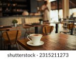 Small photo of Wooden table, coffee shop mug and cafe store, restaurant or diner for commerce beverage, drink or retail shopping service. Tea cup, morning espresso or startup small business for fresh caffeine sales