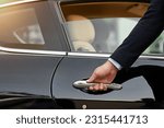 Small photo of Businessman, hands and chauffeur driver by car door for travel accommodation or commute in the city. Hand of male person on vehicle handle in professional transport service, business class or pick up